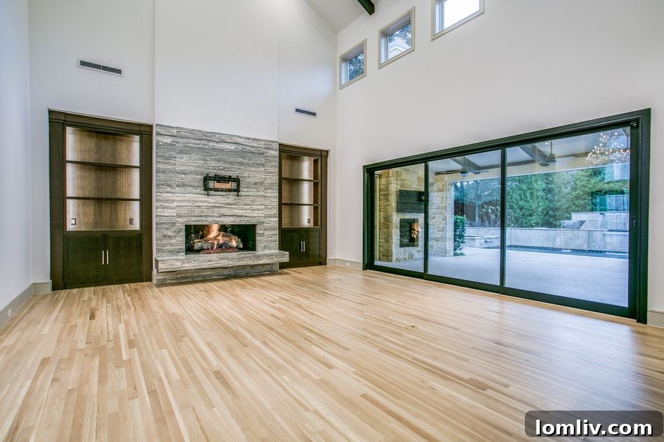 Spacious great room with telescopic sliding doors to the backyard