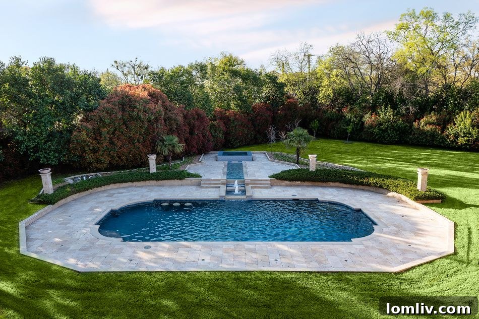 Spacious living area with high ceilings and fireplace