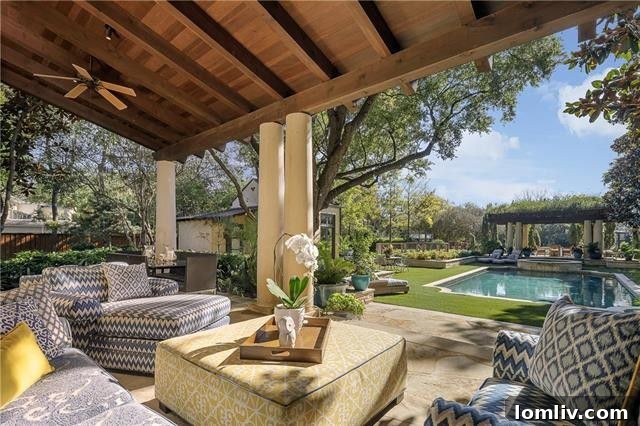 Resort-style pool with vine-covered pergola