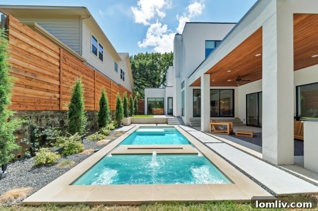 Modern home with resort-style pool by Classic Urban Homes