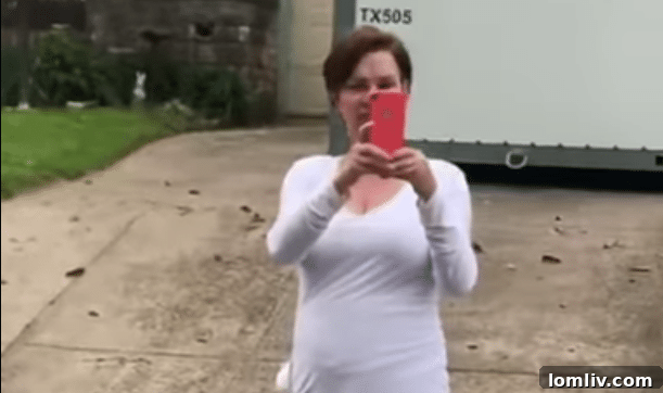 Valerie Jacobs' home with a 'for sale' sign in the backdrop of the viral Taco Truck Tammy video.