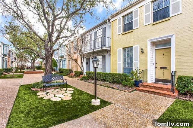 Bright and inviting living room of an updated condo at 9841 Valley Meadow Court, featuring new flooring, fresh paint, and abundant natural light.