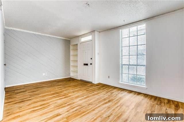 Modern bathroom vanity with updated fixtures and mirror in a renovated condo at 9841 Valley Meadow Court, Dallas.