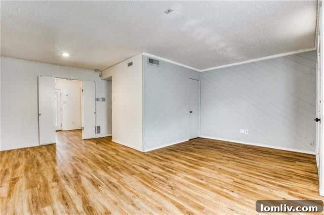 Compact and efficient u-shaped kitchen with modern appliances and ample counter space in a Dallas rental condo at Valley Meadow Court.