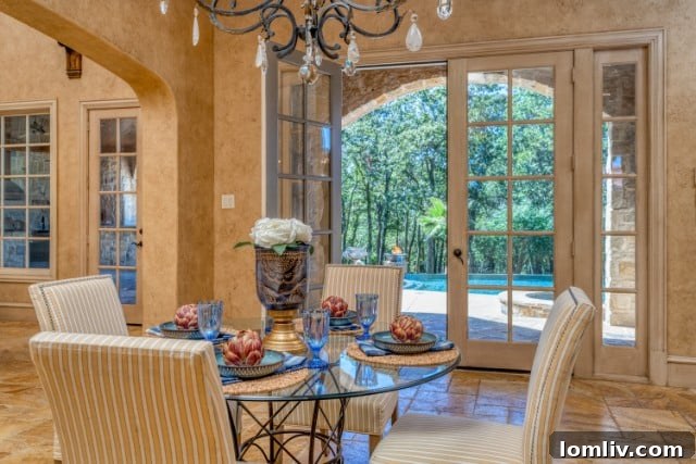 Elegant bedroom interior with French-style decor and a large window