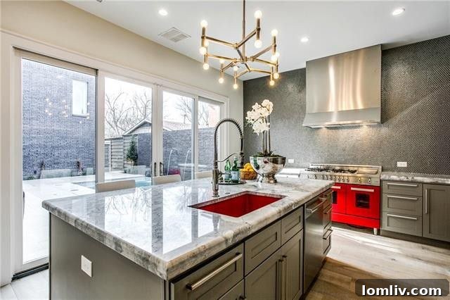 Modern chef's kitchen featuring a large island with seating, high-end stainless steel appliances, and custom cabinetry