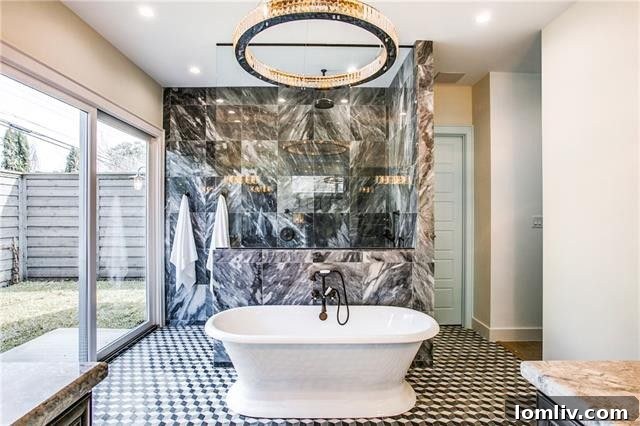 Spacious and elegantly designed walk-in closet with custom shelving and ample storage in a luxury Dallas home