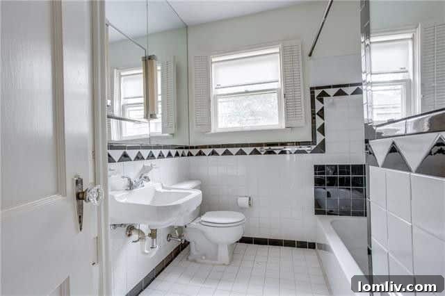 Well-equipped kitchen and dining area in the charming Lakewood apartment