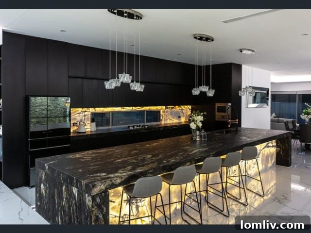 Controversial real estate marketing video featuring models dancing on a kitchen countertop