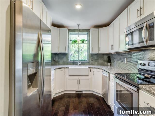 A Remodeled Turtle Creek Brownstone: Your Gateway to Urban Living 5 Elegant Living Room with Fireplace and Natural Light