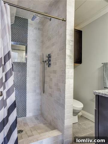 A Remodeled Turtle Creek Brownstone: Your Gateway to Urban Living 7 Luxurious Bathroom with Designer Tile