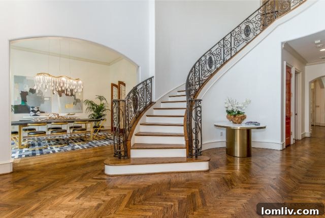Saint Johns Spanish Villa: A Jewel of Design and Grandeur 3 Highland Park Luxury Home Interior - Wrought Iron Staircase
