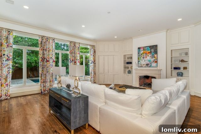 Saint Johns Spanish Villa: A Jewel of Design and Grandeur 5 Living Area with Fireplace and Custom Shelving