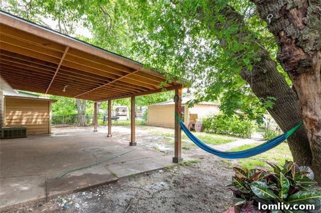 Covered Patio and Ample Storage in Renovated Dallas Property