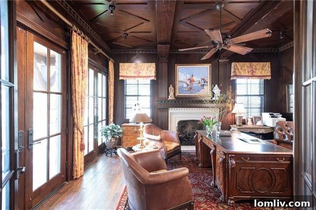 Elegant Living Room with Fireplace in University Park Tudor Home