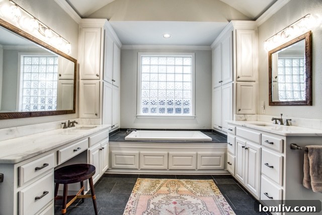 Spacious and bright master bathroom with walk-in shower at 6654 Gascony Place