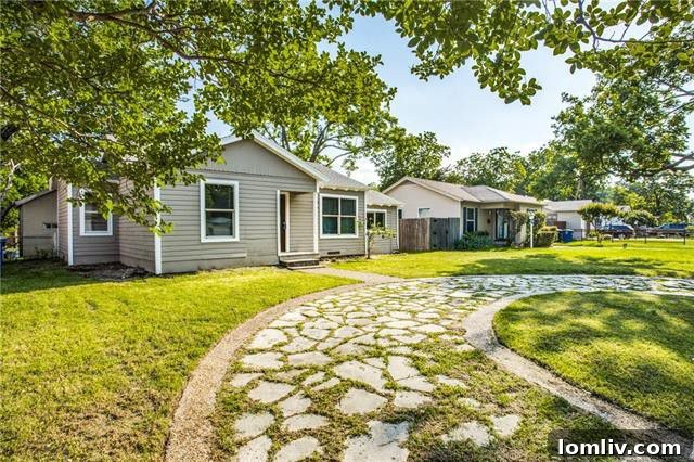 Charming Midcentury Cottage exterior at 8232 Rayville Drive Dallas TX