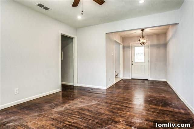 Interior view of the living room with refinished hardwood floors at 8232 Rayville Drive
