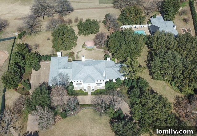 Sprawling 2.25-acre estate with breathtaking 8th fairway views of the exclusive Shady Oaks Golf Course.