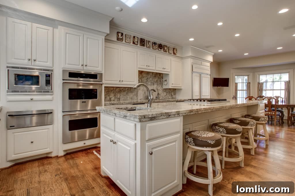 Spacious kitchen with elegant 6-inch oak floors, perfect for entertaining and family gatherings.