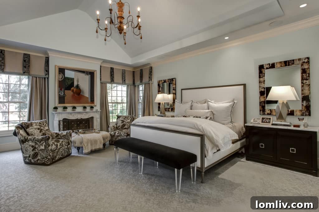 Recently expanded master suite at 6158 Indian Creek Drive, offering scenic views and a cozy fireplace.