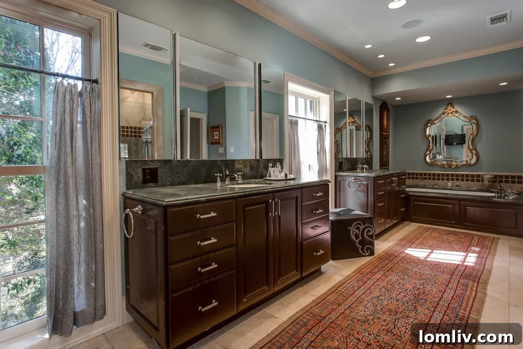 Luxurious master bathroom with two large closets, towel warming rack, whirlpool tub, and coffee bar.