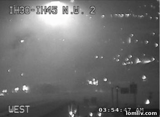 TxDOT camera footage showing dense smoke reducing visibility on nearby highways during the Ambassador Hotel fire.