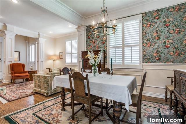 Cozy dining area in a traditional Dallas home with views of the backyard