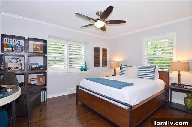 Bright master bedroom with ample windows and a contemporary feel