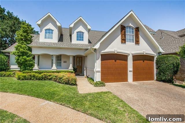 Elegant traditional home exterior in Wellington on the Creek, Midway Hollow