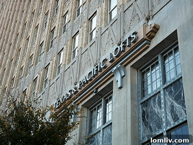 Exterior view of the historic Texas & Pacific Lofts building in Fort Worth, showcasing its Art Deco architecture.