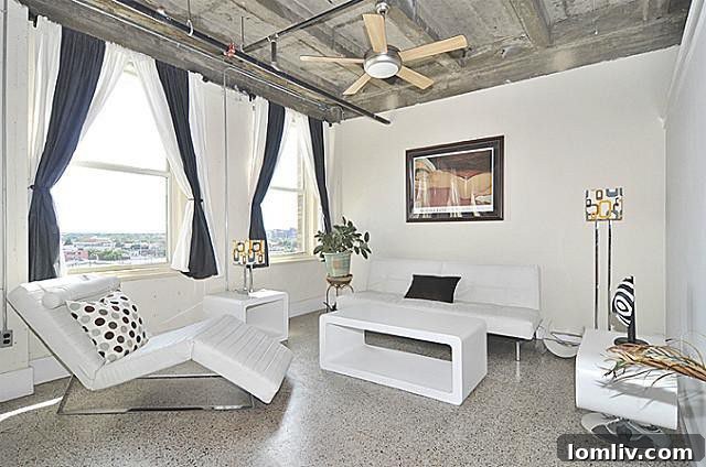 Modern fitness center within the Texas & Pacific Lofts, showing various exercise equipment.