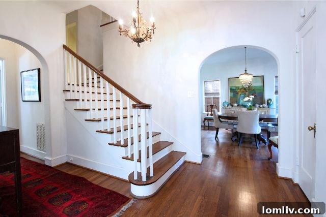 Elegant Living Room with Beamed Ceiling at 1215 N. Winnetka