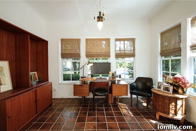 Ornate Details and Period Lighting Fixtures Throughout the Home