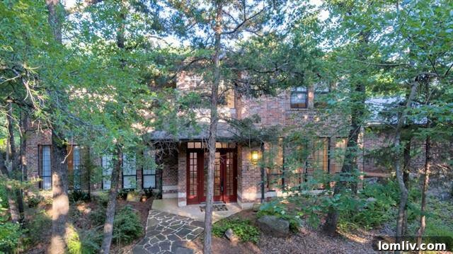 Exterior of a luxurious renovated home on 6.5 acres in Oak Point