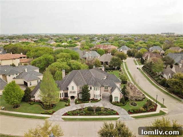 Frisco Starwood Luxury Residence Commands $2.3 Million 3 Elegant entry foyer with soaring ceilings and luxurious flooring inside 5008 Monterey Drive