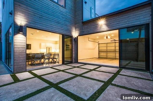 Modern Home Rear Exterior with Sliding Doors 4685 Deere Street Modern Home Exterior Rear