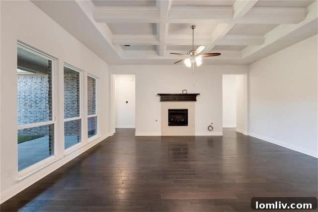Modern gourmet kitchen with stainless steel appliances and large island