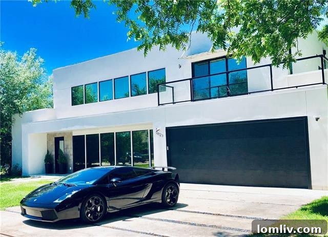 Spacious modern living room with high ceilings and natural light