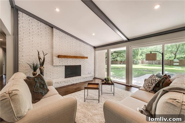 Open concept living area with abundant natural light and floor-to-ceiling windows in a Dallas home