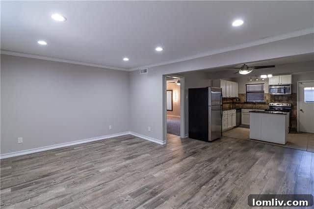 Bright and updated kitchen with granite countertops, new appliances, and ample cabinet space