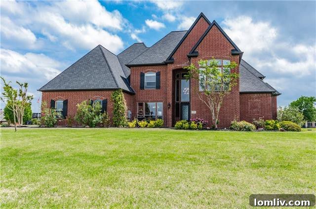 Exterior view of a custom lakefront home in Princeton Lakes, TX