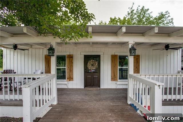 Exterior view of a charming tiny house nestled on a sprawling rural property