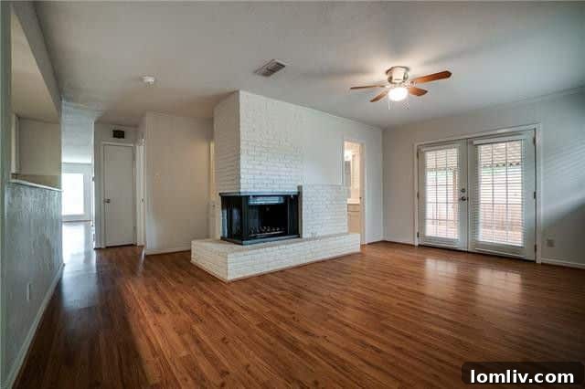 Updated kitchen area featuring ample cabinet space and modern appliances in the Dallas duplex