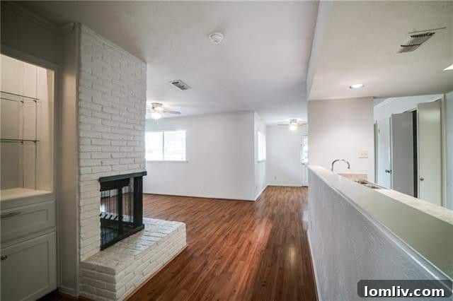 Comfortable master bedroom with natural light, part of the well-maintained Dallas rental property