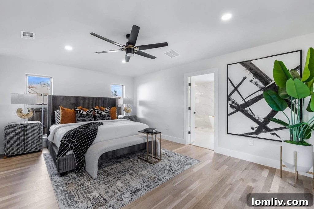 Spacious and brightly lit master bedroom, designed for ultimate comfort