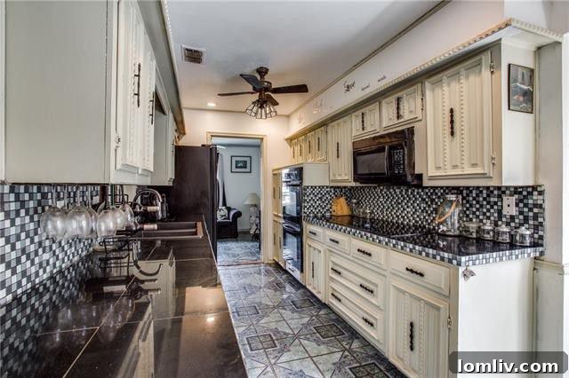 Updated master bathroom with dual vanities and contemporary fixtures