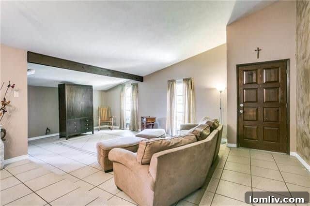 Large and comfortable master bedroom with ample space for furnishings in a Dallas property