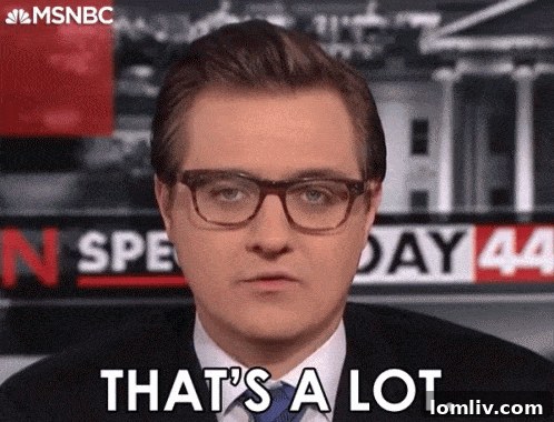 A shot showing another room, possibly a dining area or a more formal living space, equally saturated in red and gold.