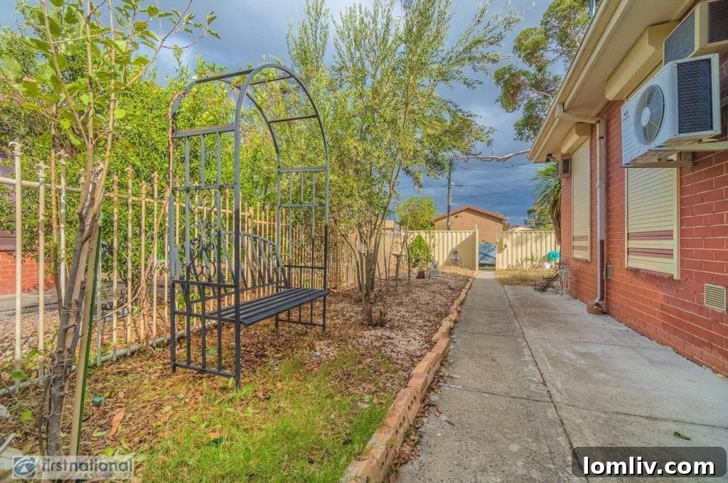 The exterior of the house, focusing on the front garden and porch, still conventional.